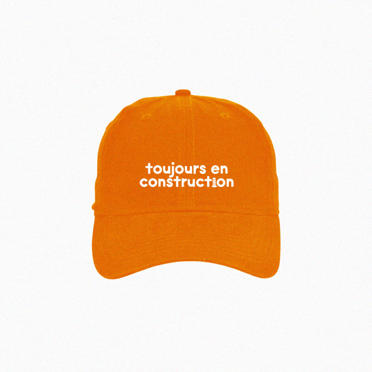 'toujours en construction' dad cap in montreal orange